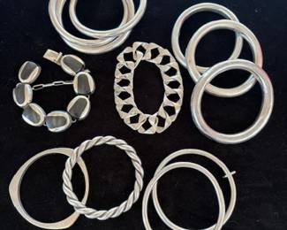 More vintage Taxco sterling, sterling and onyx bracelets