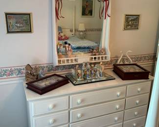 Dresser with wall mounted mirror 