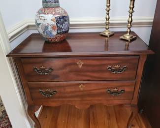 Chinese ginger jar, brass candlesticks, and queen-ann table