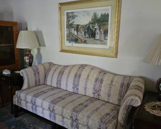 Beautiful camel-back sofa