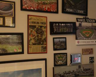 MANY framed photos and puzzles of pro, local, and college stadiums; as well as news stories, etc.