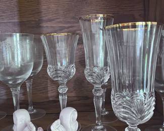 Gold rimmed cut glass goblets