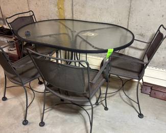 OUTDOOR TABLE AND 4 CHAIRS