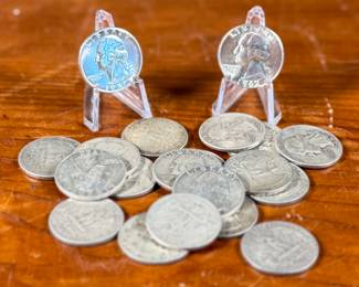This lot features a collection of pre-1964 silver quarters. $5.00 total face value which includes twenty (20) silver quarters. A few appear to be uncirculated.