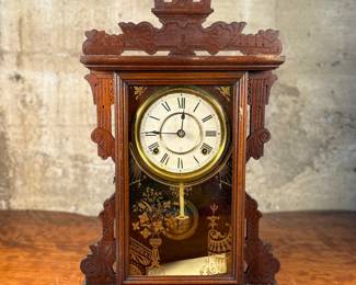 This lot features an antique Seth Thomas mantle clock. Comes with the purchase receipt, pendulum, and key. Comes untested and measures, 19.5” H x 13” W x 4” D.