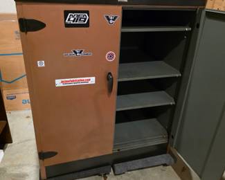 Locking storage compartment.