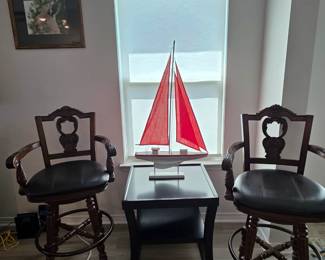 Pair of Barstools.  Occasional table.  Decorative sailboat.