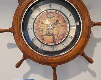 Rhythm clock.  Face opens and spins.  $300