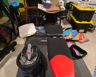 Weight lifting bench, shop vac.