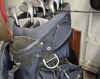Set of Ping golf clubs in bag