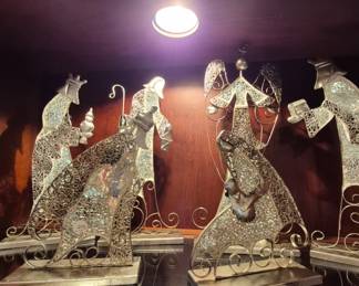 Nativity Set in gold filigree.  the three KIngs  bringing gifts to baby Jesus.