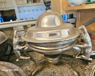 unique silver-plated serving dish with holding rabbits e