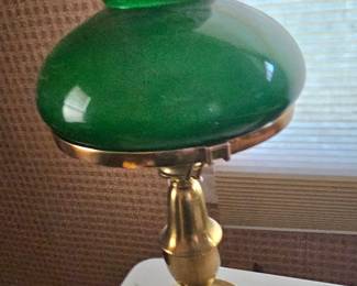 green glass hurricane lamp