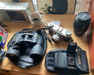 vintage cameras, binoculars, radios