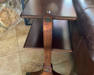 Vintage tiered table on casters, one of two