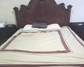 King Size Bed And Frame With Assortment Of Pillows And Covers
