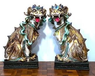 Large Antique Chinese Terracotta Foo Dogs which were personally carried over next to the lady of this estate in the early 1970s on a jet airliner