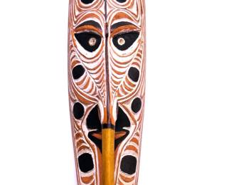 Hand carved and painted wooden African mask that was acquired during a trip to African in the 1960s