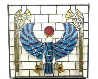 Stain glass window with Egyptian falcon god Horus