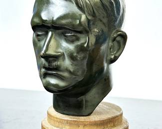 1930s bronze bust of Adolf Hilter which as brought to the US by an American WWII soldier as a 'war prize' for the victors. CAPITOL SALES SERVICES does not support or condone Adolf Hitler or the Nazi Party and is only offering this as a historic relic that was brought over by An American GI as part of the victorious allied forces.