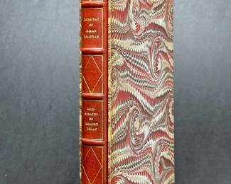 Book - Nice leather bound with box sleeve vintage copy of Rubaiyat of Omar Khayyam that was rendered Into English Verse by Edward Fitzgerald.  The illustrations are by Edmund Dulac. 