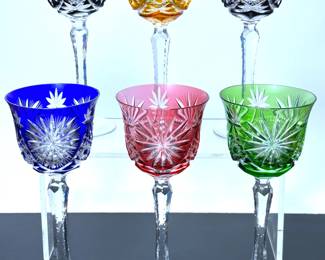 A set of cut to clear crystal wine goblets