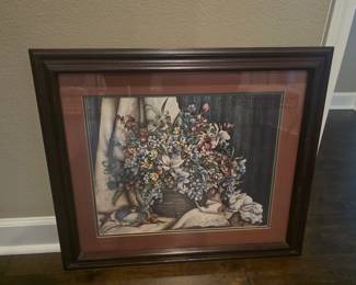 Picture of flowers & decor framed under glass