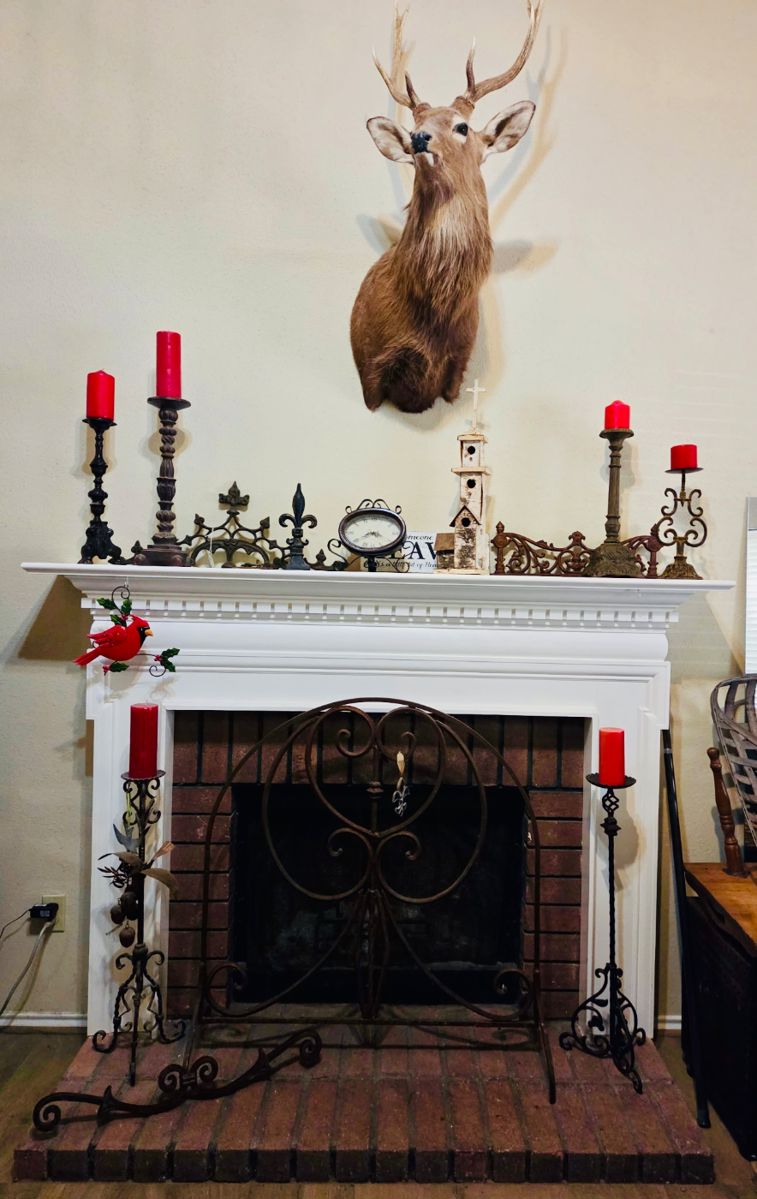Wrought iron and cast-iron candlesticks, iron decorations, fireplace screen