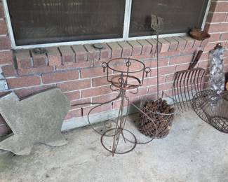 Texas stepping stone, metal plant stand, pitch fork