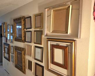 Wall of frames all styles and sizes