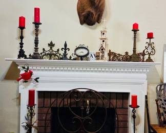 Wrought iron and cast-iron candlesticks,  iron decorations, fireplace screen