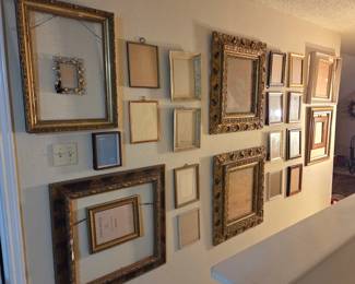Wall of frames all styles and sizes