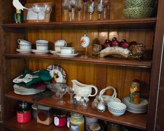 Candles glasses, tea cups and saucers,  Salt and pepper shakers