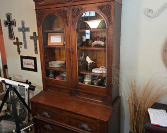 Victorian antique desk was carved of solid walnut about 1870, this imposing drop-front secretary has a  glass door bookcase top 