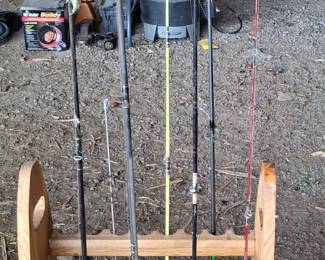 Several Fishing Poles (Stand NOT For Sale)