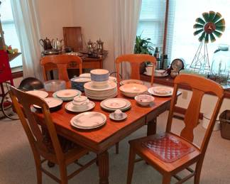Antique Table W/4 Leather Bottom Chairs and 3 Leaves! Great Condition! Pfaltzgraff Dishes on the Table!