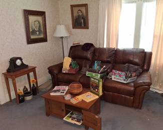 Power Reclining Leather Couch and Antique Pictures on the Wall!