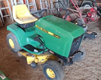 John Deere Liquid Cooled Riding Lawn Mower. 38 inch Deck.