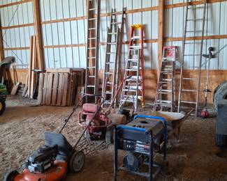 Lots of Various Size Ladders! A Generator, Rear Tine Rototiller and 2 Push Mowers!