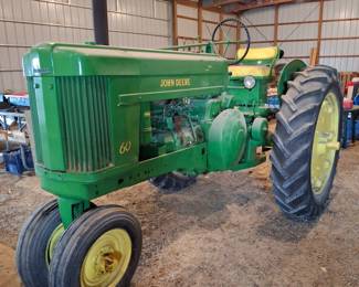 1954 John Deere 60 Tractor. 1 of 2. Runs Excellent! Fresh Fuel and New Battery! Newer Paint!
