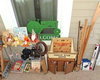 Several Winnie the Pooh Items, Local Jasper Auto Insurance Clock, Vintage Yard Sticks and Cameras and More Barbie Clothes in the Wood Box!