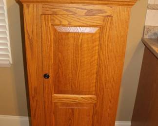 Whitacre's storage cabinet in oak