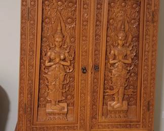 Decorative cabinet with three shelves inside and two drawers, comes with key, top is 35”, 20” deep, 65 ½” tall, base is 42” wide