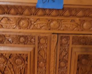 Decorative cabinet with three shelves inside and two drawers, comes with key, top is 35”, 20” deep, 65 ½” tall, base is 42” wide