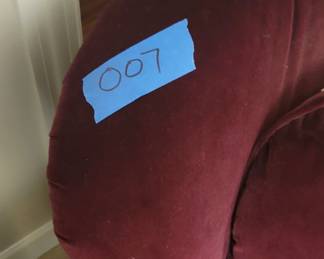 Purple chair with ottoman, arms have wear, fringe ottoman is missing a wheel, ottoman is 32” wide, 20” deep, 16” tall