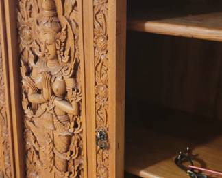 Decorative cabinet with three shelves inside and two drawers, comes with key, top is 35”, 20” deep, 65 ½” tall, base is 42” wide