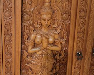 Decorative cabinet with three shelves inside and two drawers, comes with key, top is 35”, 20” deep, 65 ½” tall, base is 42” wide Wonderful detail