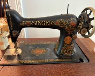 Antique Singer sewing machine- beautiful design