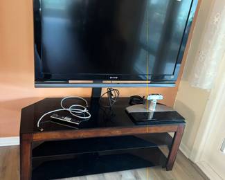 LARGE SONY FLATSCREEN AND LOW-BOY TV STAND