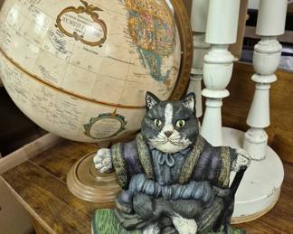 Large selection of vintage and modern cat collectibles. Cast iron cat doorstop